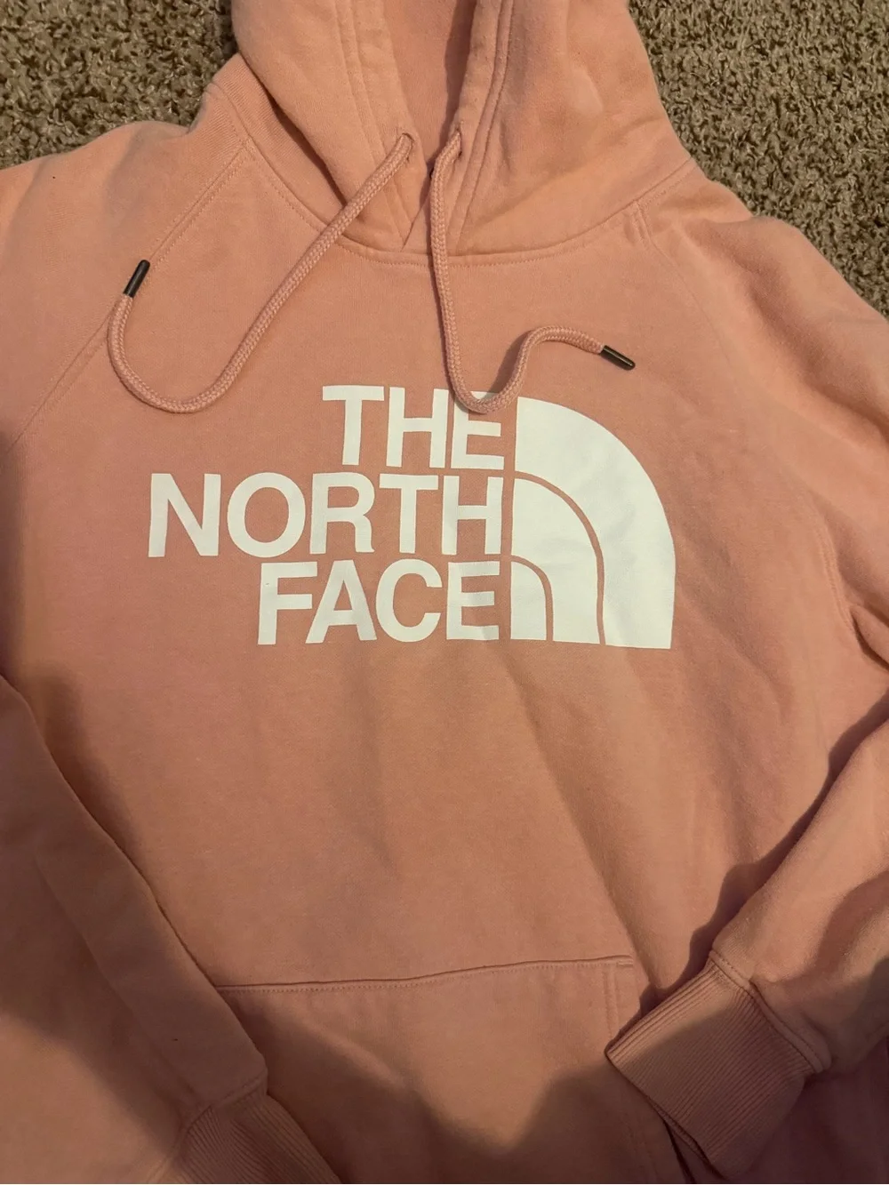 Women's hoodie with brand tag